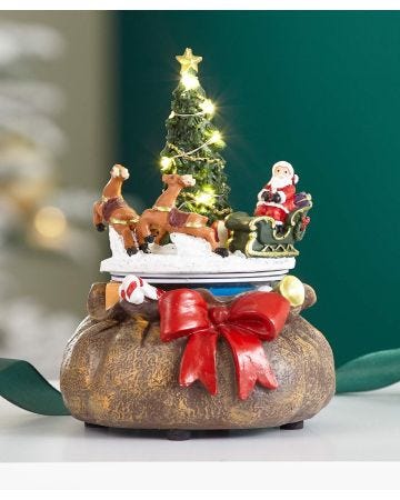 Light-up Christmas Tree with Rotating Santa Sleigh
