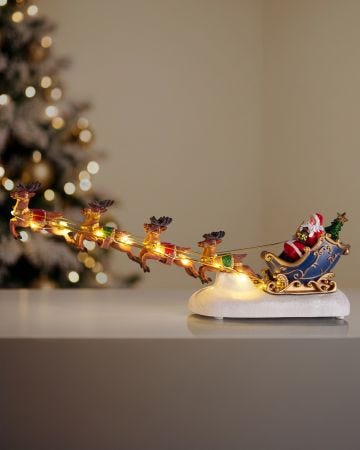Lit Santa sleigh with reindeer